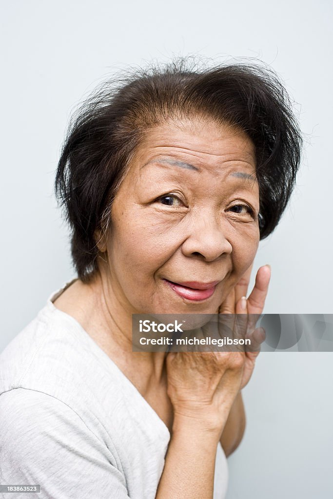 Elderly Senior Woman Portrait of an elderly senior Asian woman Active Seniors Stock Photo
