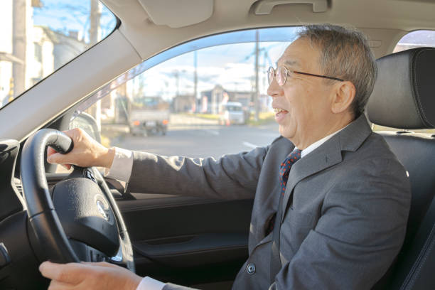 istock old businessman happy driving 1838645903