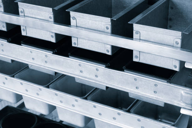 istock Rack with metal containers for cooking bakery food 1838650035