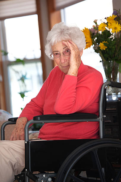 istock Senior in Wheelchair 183865130