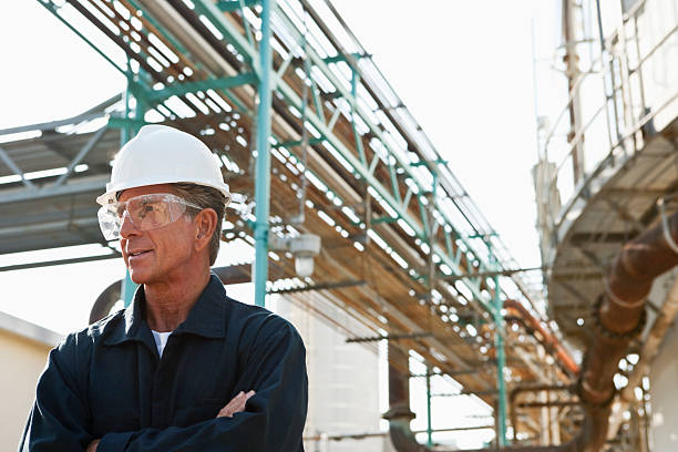 istock Senior man working as an engineer at an industrial plant 183865461