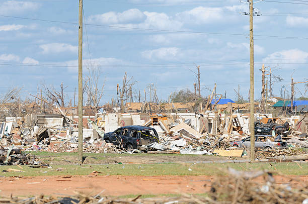 istock Debris and damaged cars after tornado 183865639