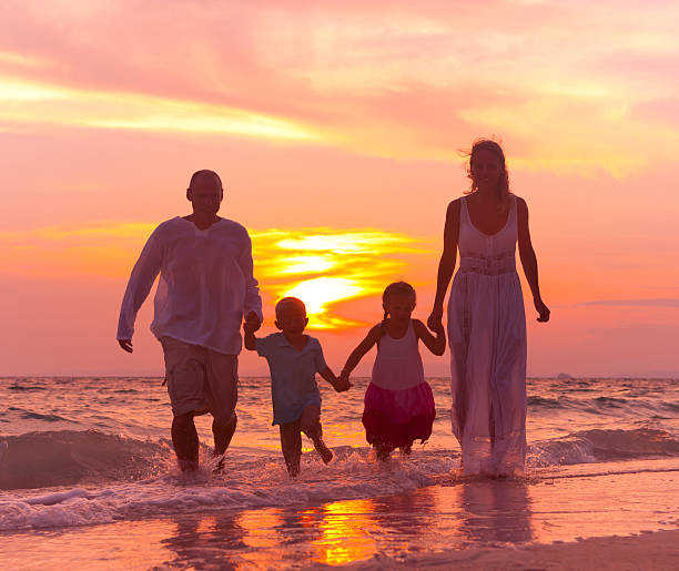 istock Family having Fun on Vacation with perfect Sunset 183865817