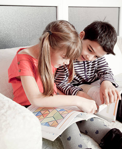 istock Boy and girl studying 183865918