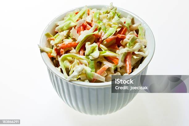 A Bowl Full Of Coleslaw On A White Background Stock Photo - Download Image Now - Coleslaw, Cut Out, White Background
