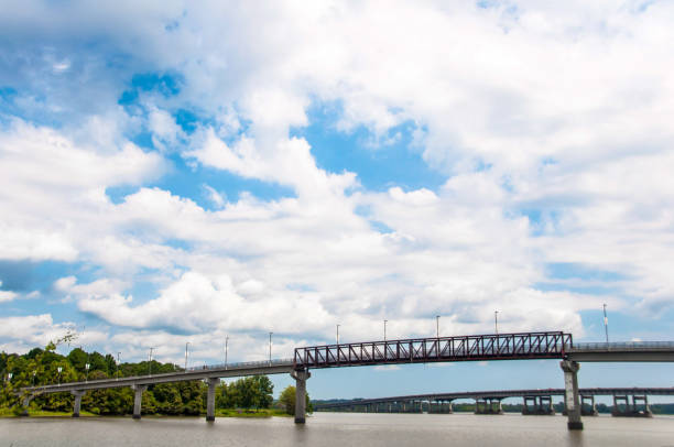istock Cloudscape at Two Bridge Park in Little Rock, AR 1838663510