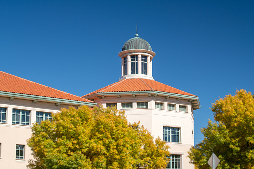 Panoramic view of the University of California, Berkeley campus on a sunny day; San Francisco, Treasure Island and the Bay bridge visible in the background; California