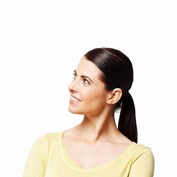 istock Attractive Woman Smiling And Looking Up - Isolated 183867777