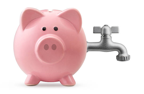 istock Piggy bank with tap 183868267