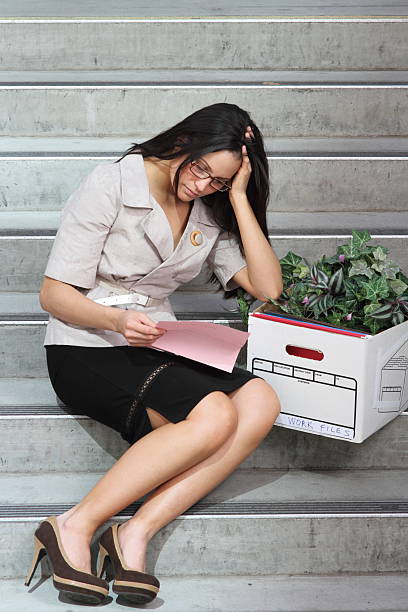 Colorful folders of personnel and office staff are kept and sorted in boxes in the office to evaluate their performance in order to raise their salary or increase their annual remuneration.