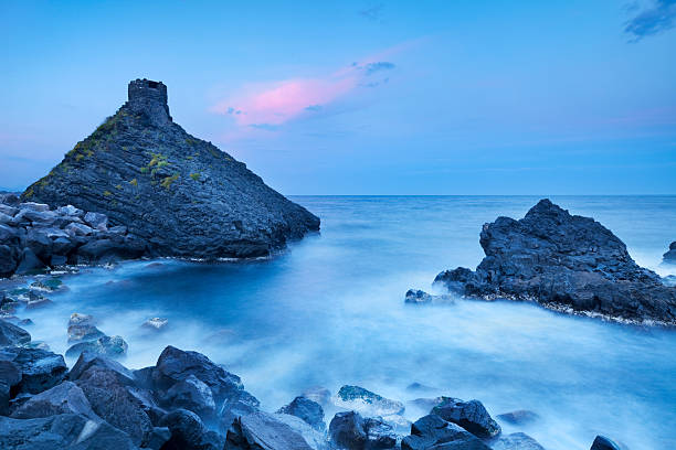 istock Dramatic coastline at sunrise on Sicily, Italy 183869418