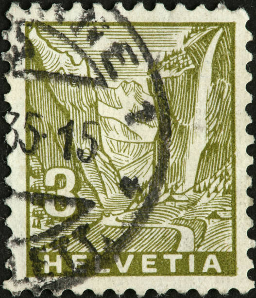 istock waterfall in Swiss valley on a postage stamp 183869618