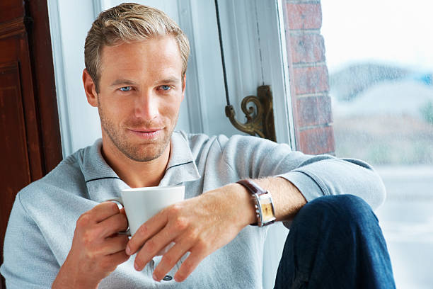 istock Thoughtful man with a cup of coffee 183870247