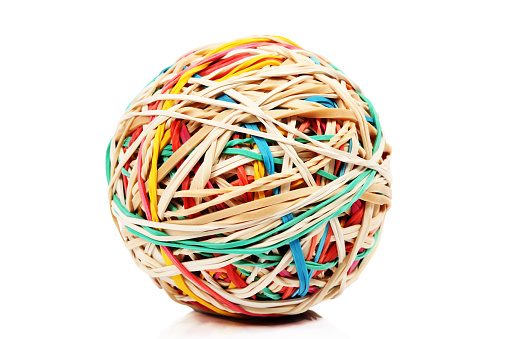 Rubber band ball on a white background.