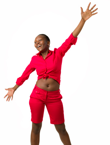 African woman  standing with her arms raised on isolated white background