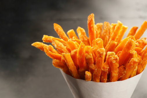 Close up of freshly made sweet potato fries.