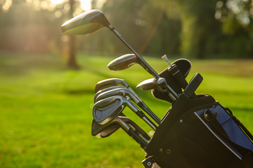 Close-up on a bag of golf clubs - Stock photo