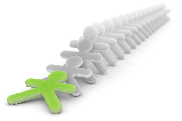 istock Green Model Figure Standing in Front of White Ones 183871248
