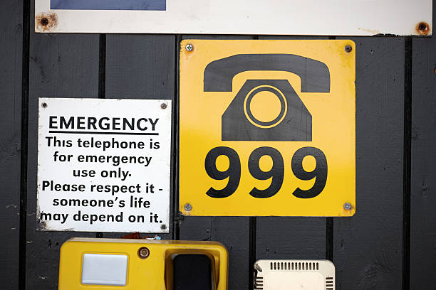 Emergency telephone sign at the coast