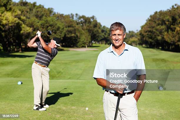 Mature Golfer Smiling Stock Photo - Download Image Now - 50-59 Years, 60-69 Years, Active Seniors