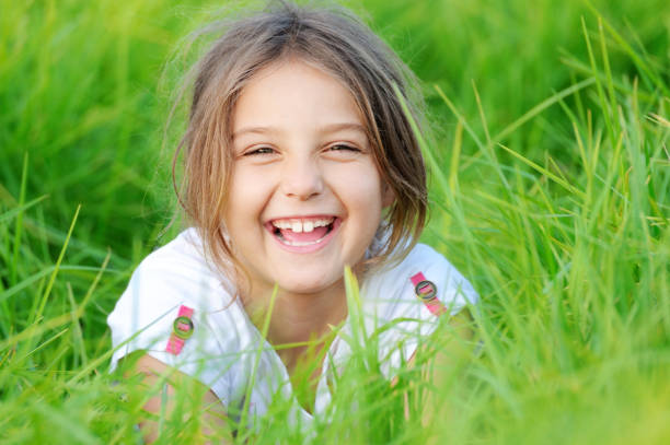 istock Child Laughing Outdoors 183872805