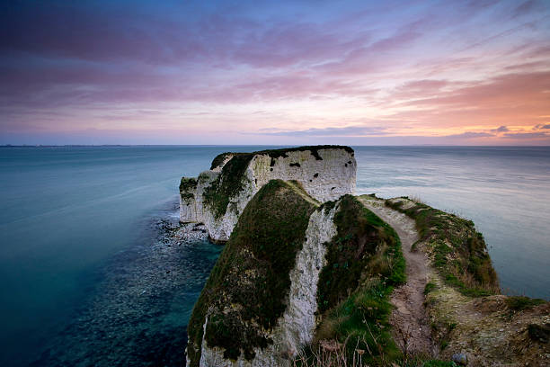 Old Harry rocks at sunrise. "The beautiful Old Harry Rocks in Studland Bay on the world heritage coastline of Dorset, U.K" christchurch england photos stock pictures, royalty-free photos & images