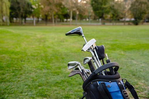 Close-up on a bag of golf clubs - Stock photo