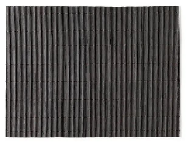 Black bamboo mat on white. This file is cleaned, retouched and contains 