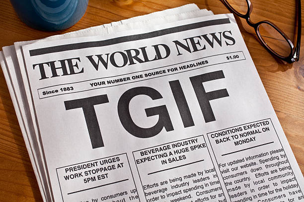 Picture of a newspaper with the phrase TGIF stock photo