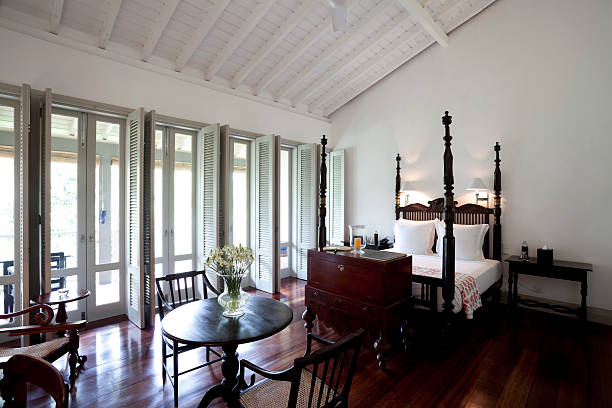 istock hotel room bedroom bed luxury 183874671