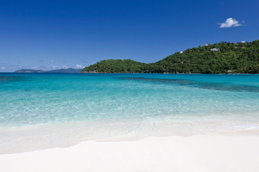 Beautiful pristine white sand beach with turquoise blue water on the island of St John in the US Virgin Islands