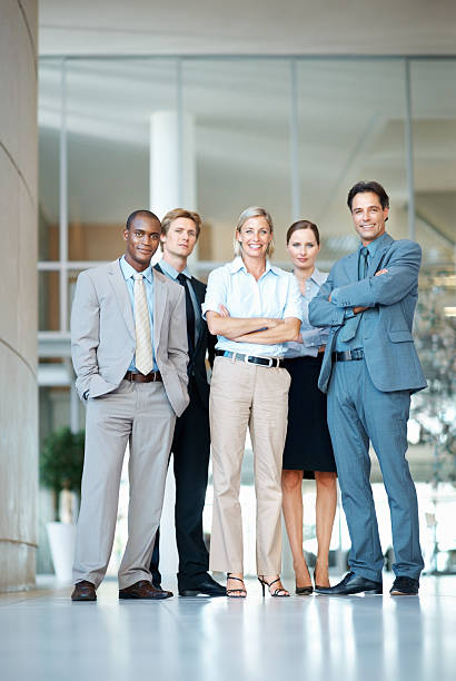 istock Business people smiling 183875065