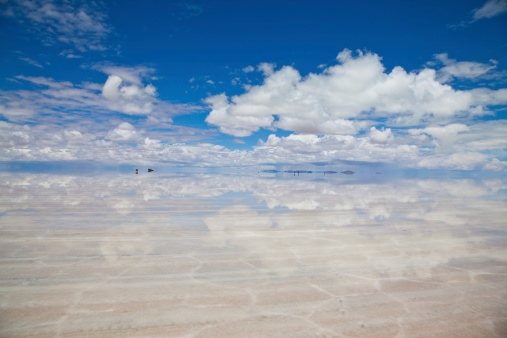 Sky Reflection On Water In Salar De Uyuni Bolivia Stock Photo ...