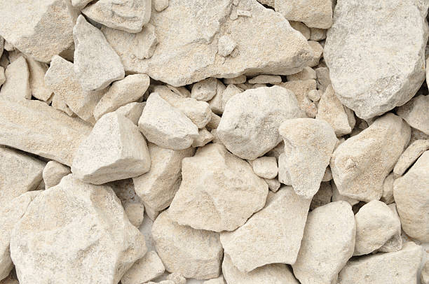 Limestone in background with rocks stock photo