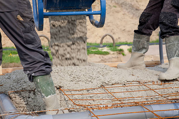 istock Pouring concrete for a new house. 183876441