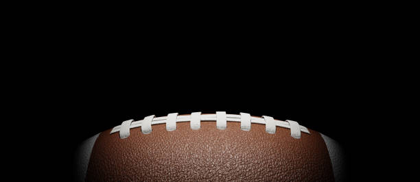istock Black copy space background with partial illumination on the football, 3d rendering 1838779846