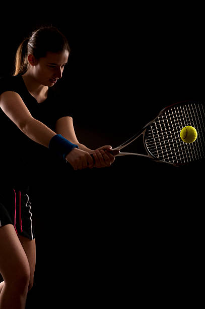 istock Female tennis player at studio shot 183878515