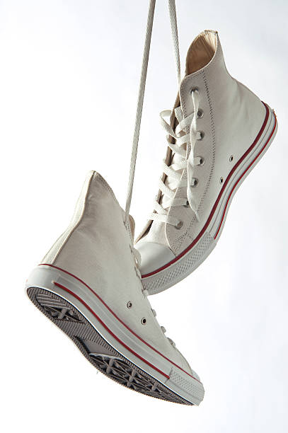 istock New Sneakers Hanging by Shoelaces 183878990