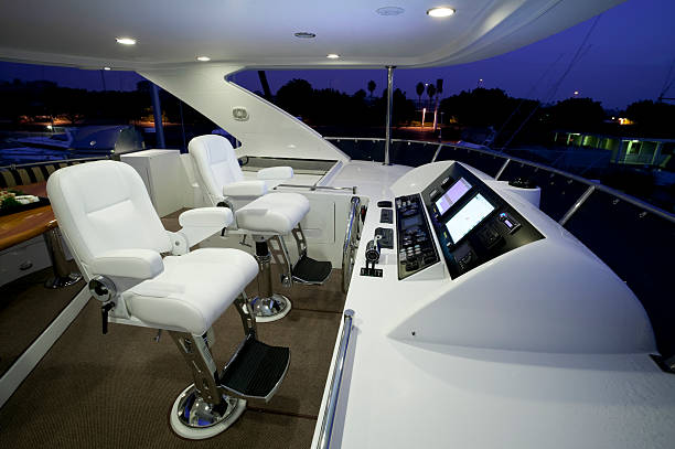 istock Inside view of yacht cabin with white panel and chairs 183879168