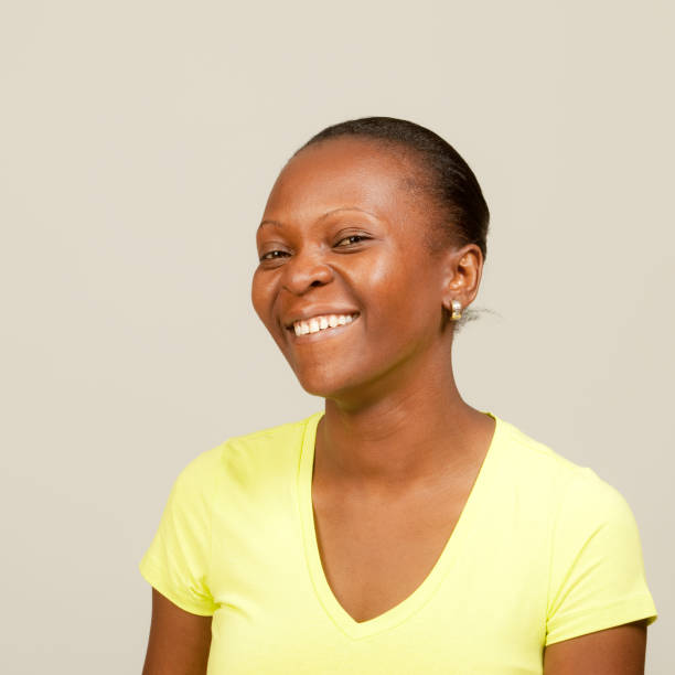 istock African woman smiling 183879636