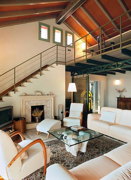 istock Modern living-room in a double level ambient with mezzanine 183879892