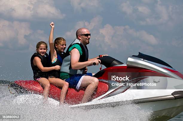 Lake Fun On Personal Watercraft Stock Photo - Download Image Now - Activity, Childhood, Color Image