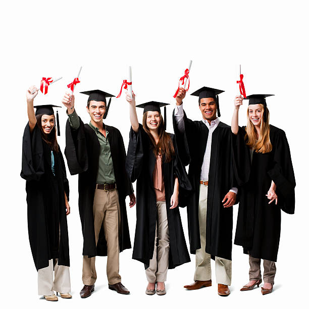 istock Graduates Holding Up Diplomas - Isolated 183880163