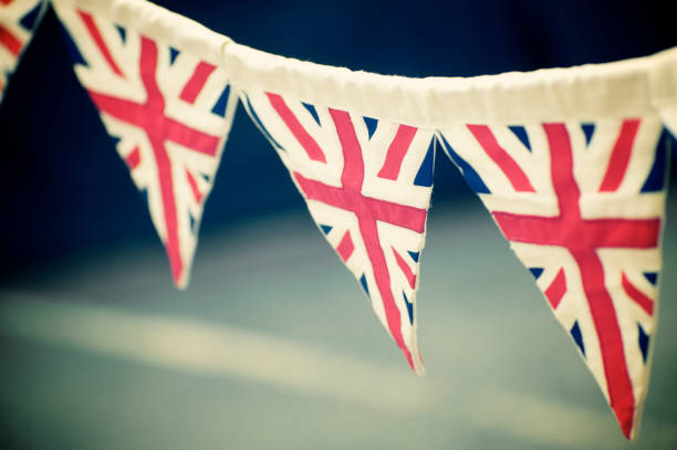 Union Jack Flag bunting hangs in the street ready for the party
