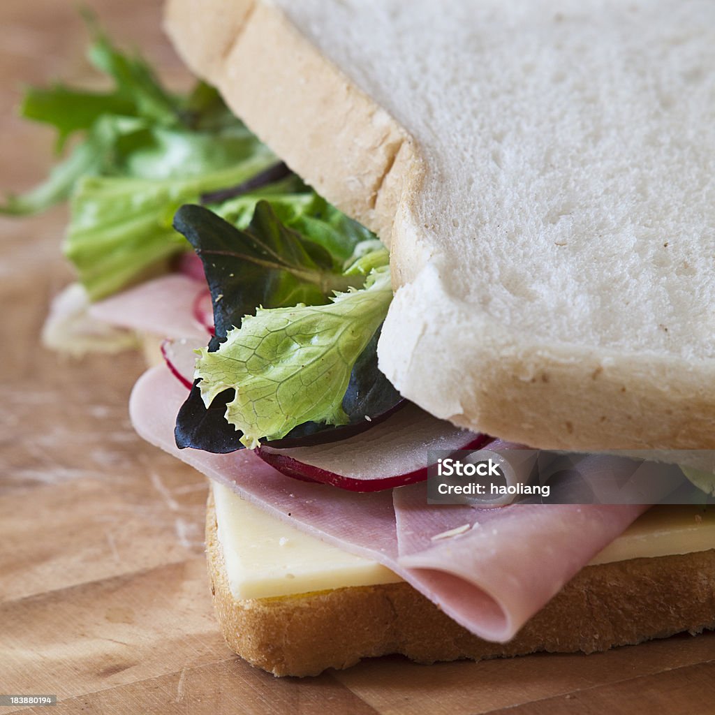 It's Lunchtime:  You Have a Ham Sandwich "home made food,chesse and ham salad sandwich with butter on choppingboardany food photos please click my food lightbox:" Bread Stock Photo
