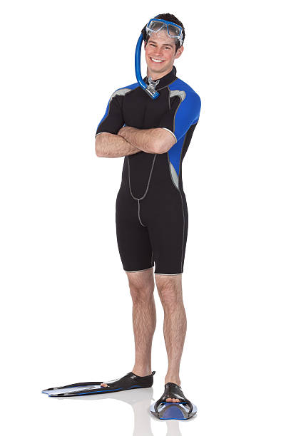 istock Man in scuba gear standing with arms crossed 183880948