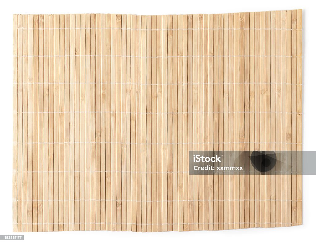 Bamboo mat "Bamboo mat on white. This file is cleaned, retouched and contains" Bamboo - Plant Stock Photo