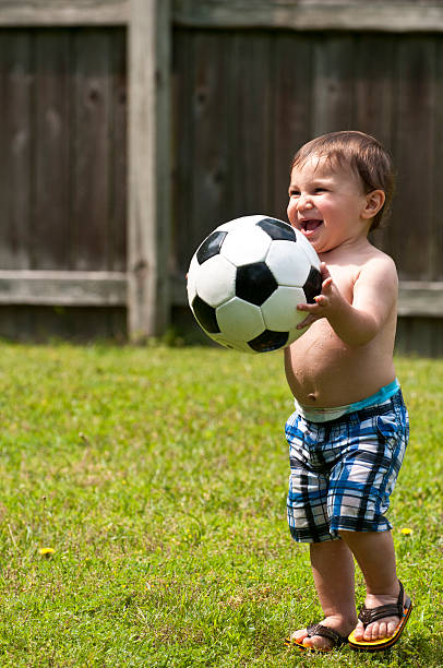 istock Boy and soccer ball 183881408