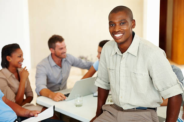 istock African American executive sitting on table during a meeting 183881682