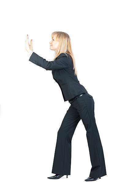 istock Businesswoman pushing something 183882147